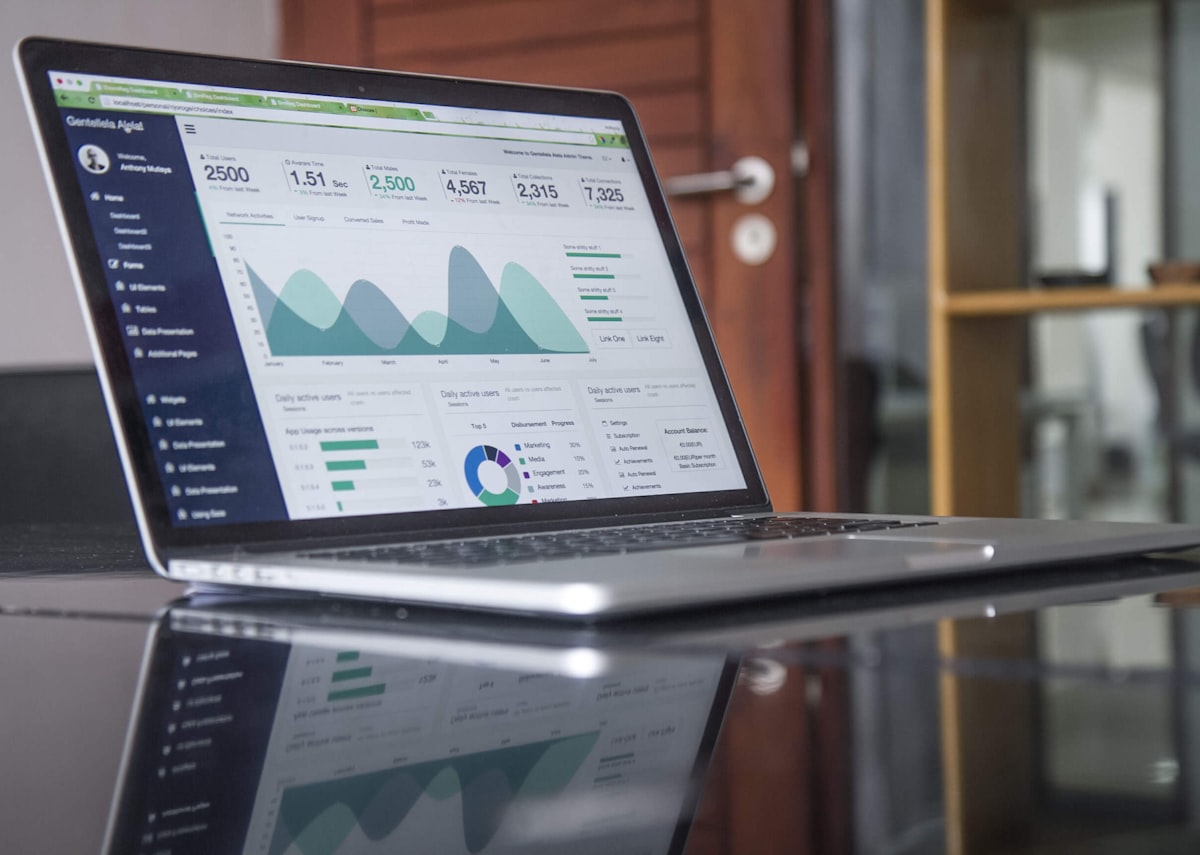 Cloud ERP general ledger and project accounting dashboard open on a laptop